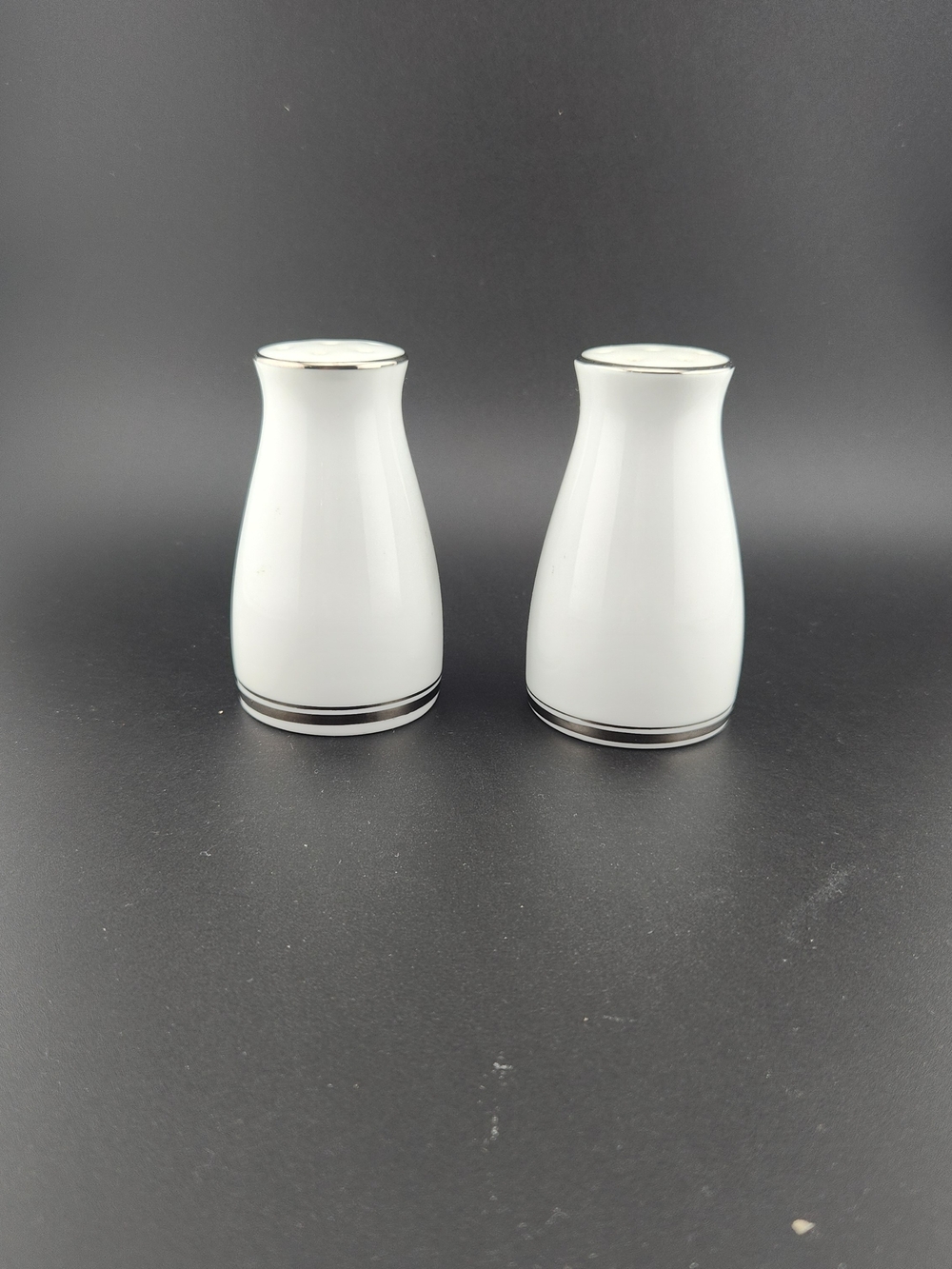 Noritake White Fine China Salt and Pepper Shakers with Silver Trim